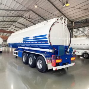 Front view of ZW Group 3 Axle Carbon Steel Oil Tanker Trailer with 45,000-liter capacity, showing durable carbon steel tank and triple axle setup.