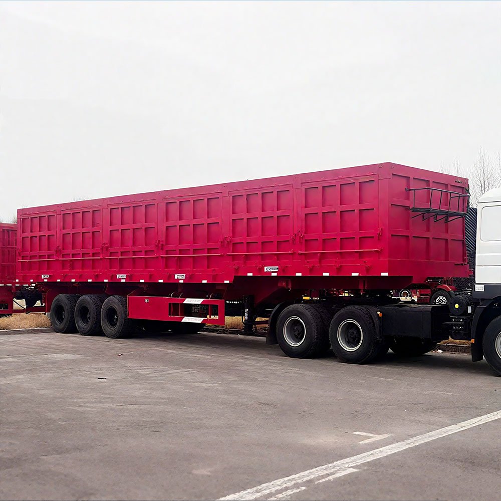 Side tipper trailer unloading bulk materials
