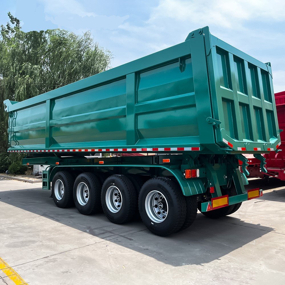 End dump trailer unloading bulk materials