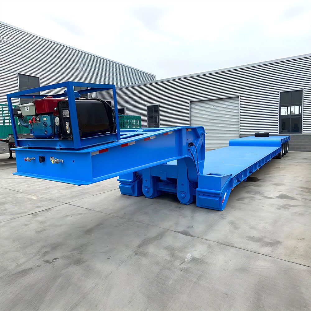 Removable gooseneck trailer transporting heavy machinery