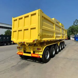 ZW Group 6 Axle 40 Ton U-Type Dump Semi Trailer front side view with heavy-duty carbon steel body and HYVA hydraulic tipping system