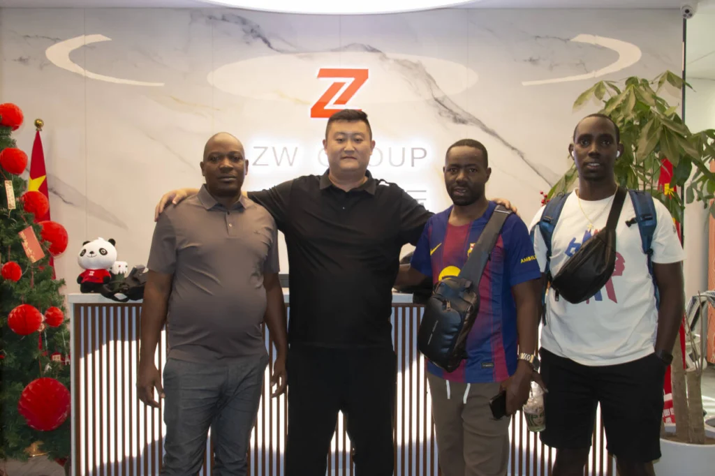 Burundi clients visiting ZW Group factory to inspect 40ft flatbed semi trailers and HOWO tractor trucks.