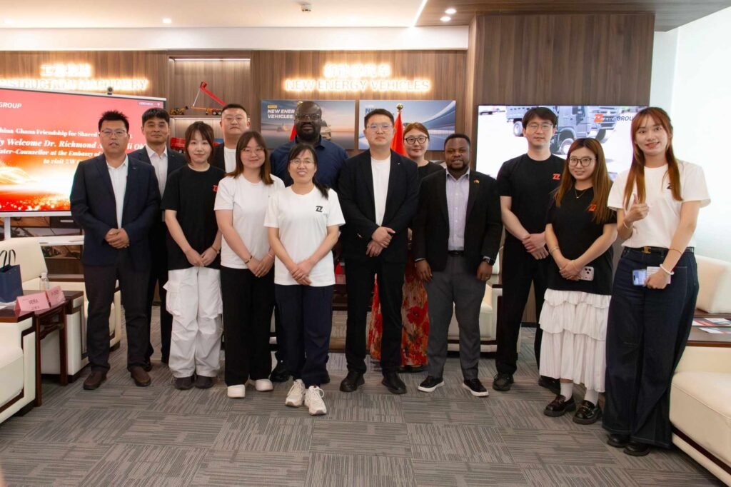 Ghana Embassy Minister-Counsellor Dr. Richmond Afotey Nii Okle posing with ZW Semi Trailer Group Chairman Yongchang Sun, General Manager Pierce Guo, and senior management team in Jinan, China