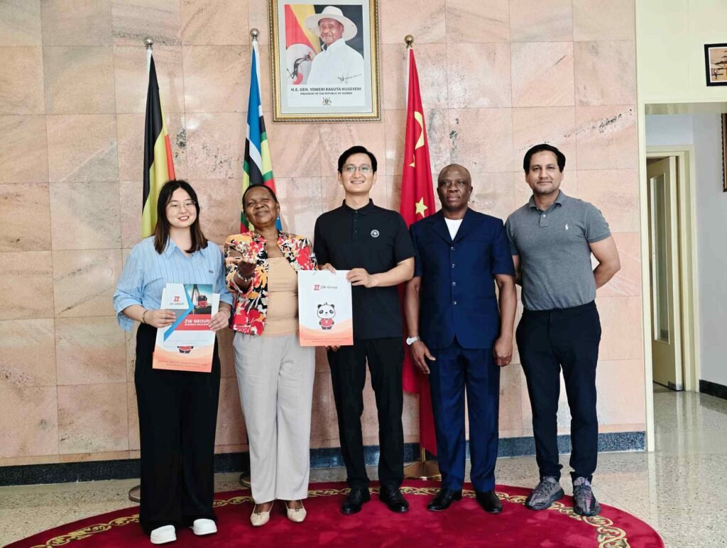 ZW Group representatives Ms. Moranda and Mr. Ray Wang meet with Uganda Ambassador H.E. Oliver Wonekha in Beijing to discuss customized semi-trailer solutions and transportation equipment.