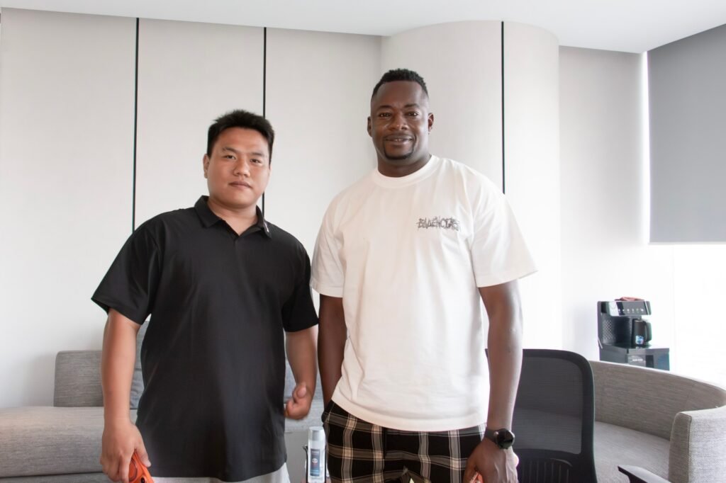 Angola client visiting ZW Group office to discuss used trucks and semi trailers Angola order