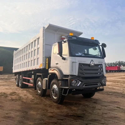 HOWO NX 8×4 400HP dump truck transporting construction materials
